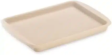 The Pampered Chef cookie sheet is what I use to bake an oval loaf.