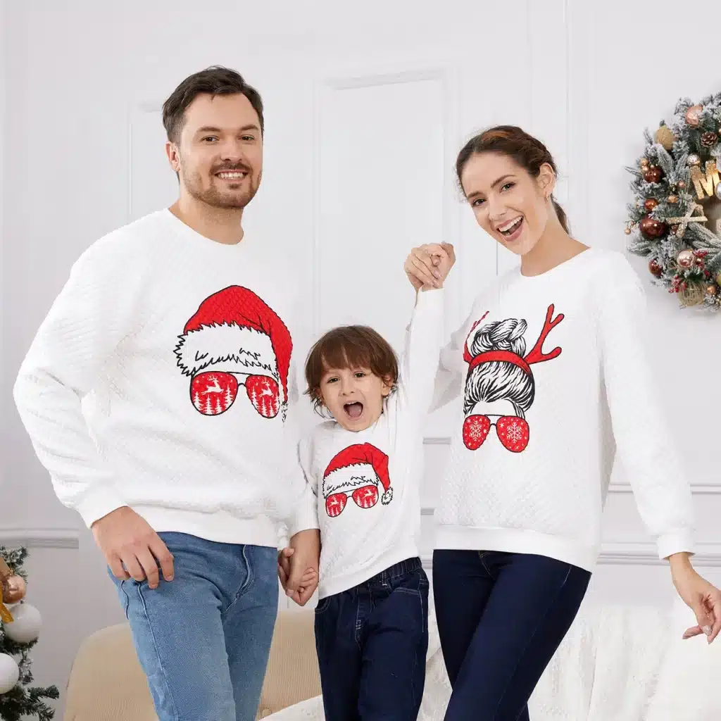 Best in Christmas attire, matching family sweatshirts