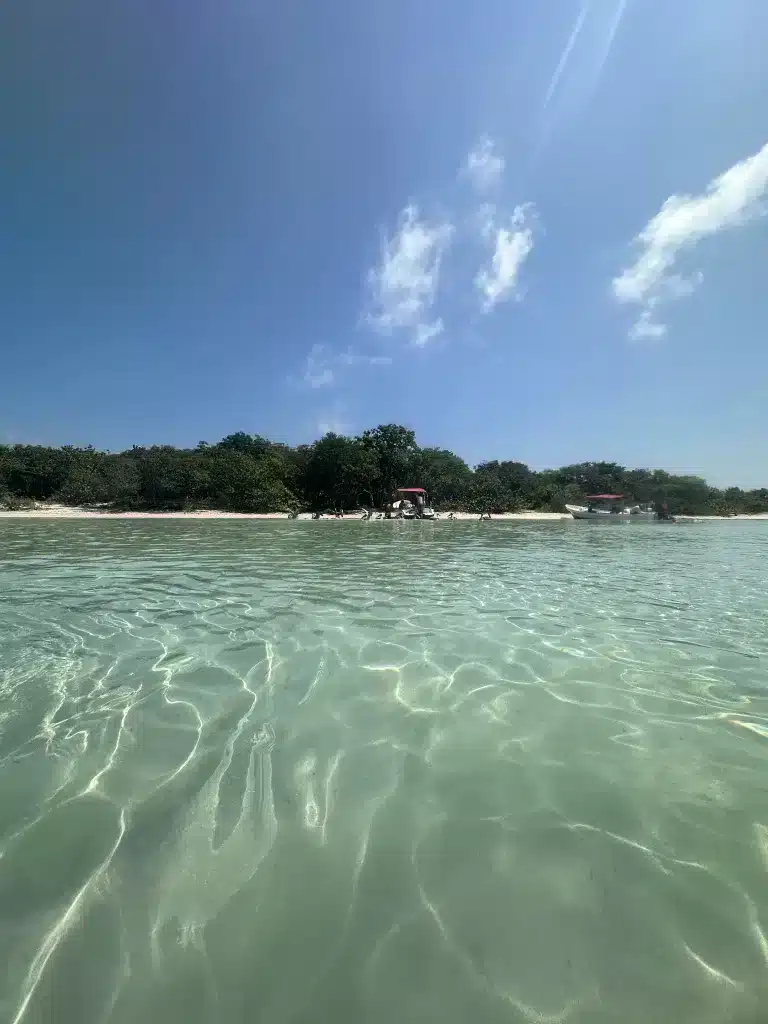 A snorkeling and fishing excursion is one of the fun things to do while on Caye Caulker or San Pedro. Here is a beautiful view of the secluded beach on Ambergris Caye. 