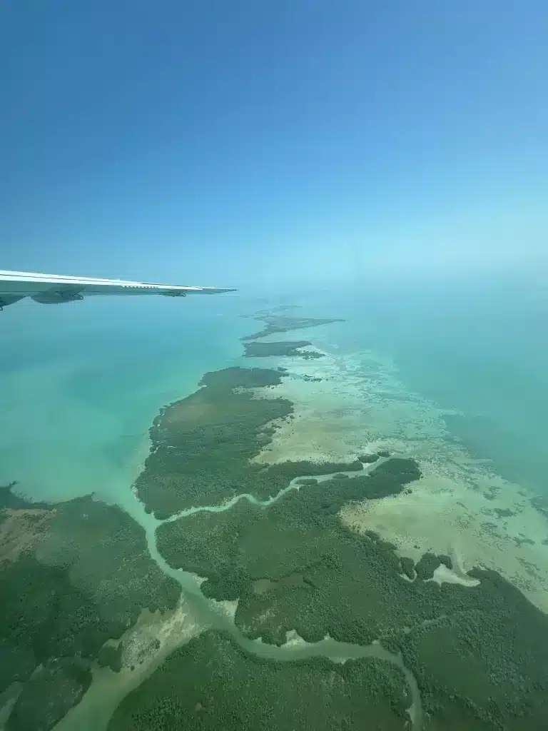 The Caribbean Sea view from Tropic Air flight.