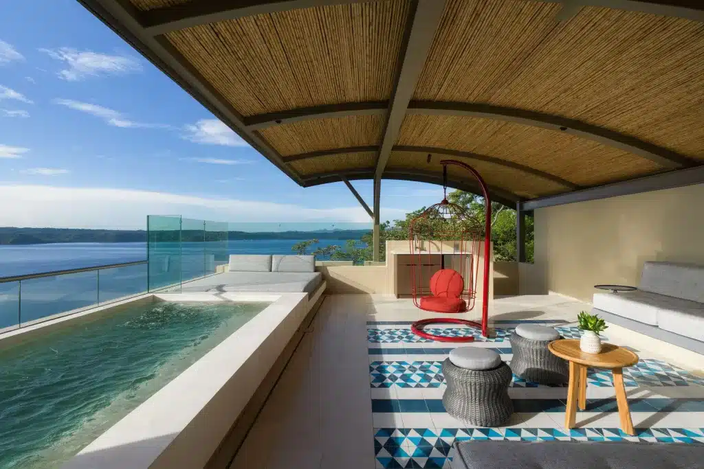 Room and pool with a view at Andaz costa Rica Resort. 