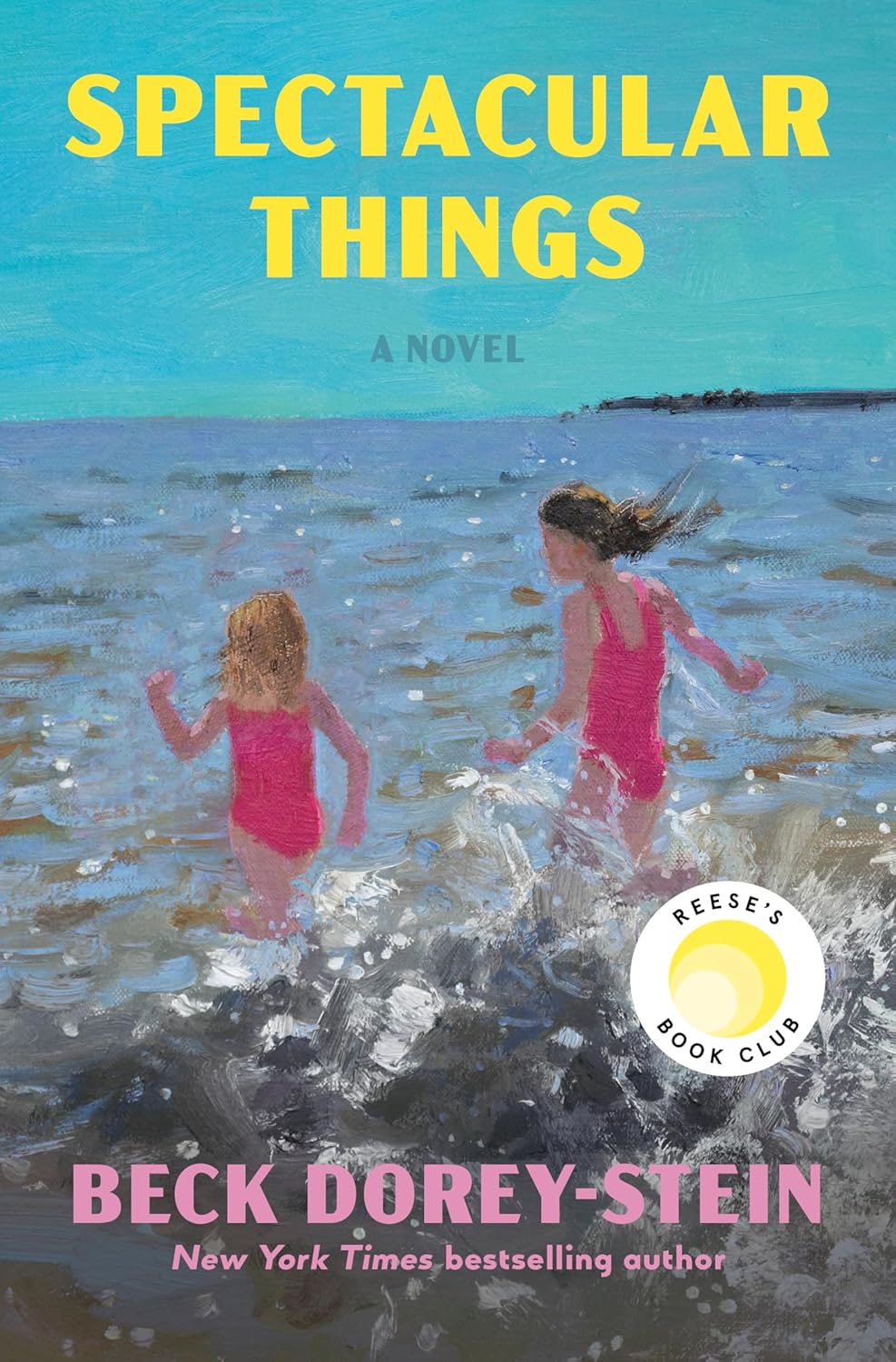 Book cover for "Spectacular Things" featuring two girls in pink swimsuits playing in the ocean waves, with a Reese's Book Club logo.
