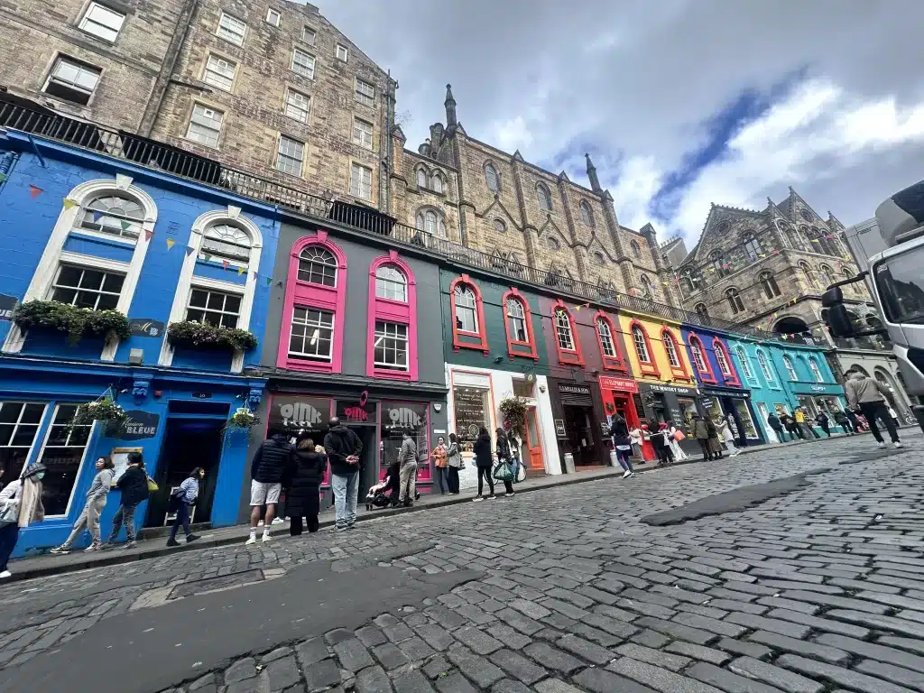 If you're wondering what to do in Edinburgh for a day, consider a stroll down Victoria Streets colorful road.