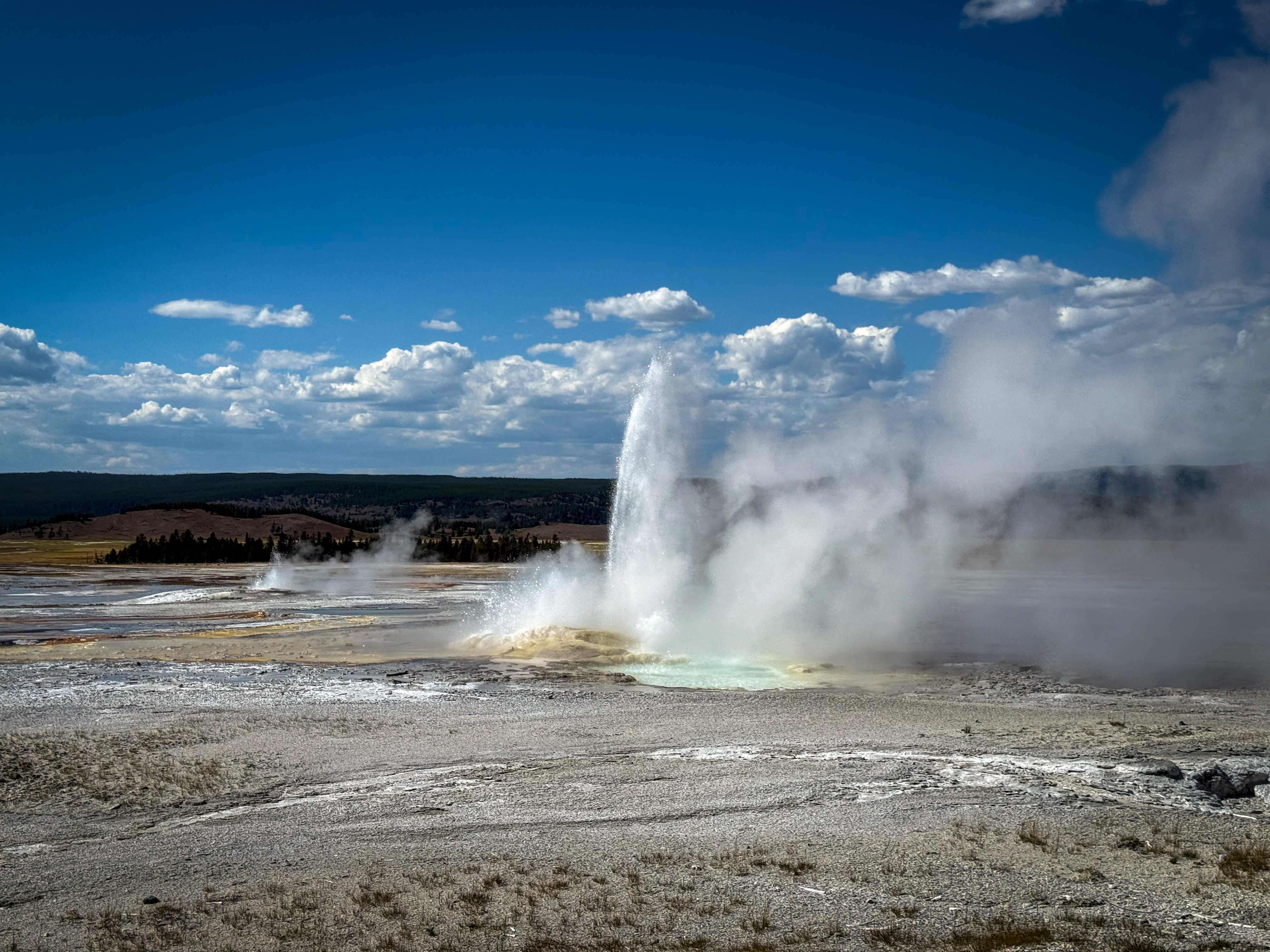 Fountain Geyser erupting in Yellowstone National Park.